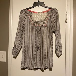 Sheer patterned top. 3/4 length sleeve. Size M
